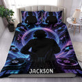 DJ duvet cover set with neon blue and purple turntables, headphones, music notes, and mixing console artwork