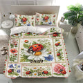 Ladybug bedding set arranged in a bright bedroom with matching floral pillowcases and botanical decor