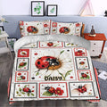 Ladybug duvet cover set styled in a bedroom with floral panels and matching pillowcases