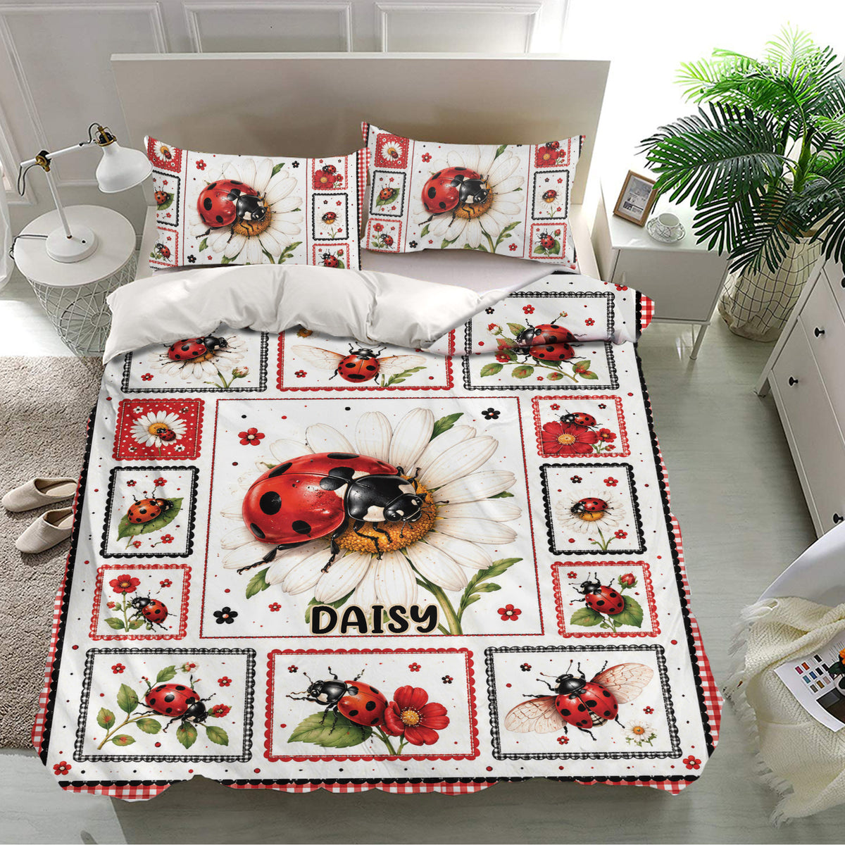 Ladybug bedding set presented on a bright bedroom bed with daisy artwork and red floral accents