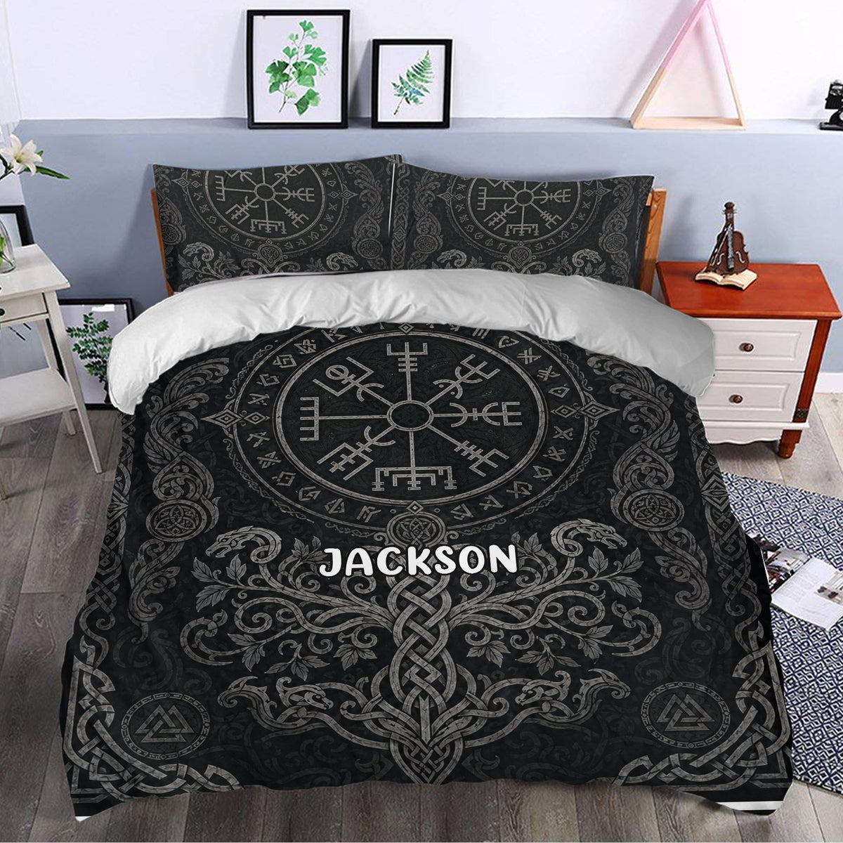Black Viking duvet cover with runes, knotwork, dragons, and a central Norse compass design on a bed