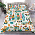 Colorful surfing duvet cover set displayed on a bed with surfboards, ocean waves, palms, and tropical beach artwork
