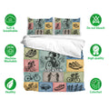 Bicycle bedding set shown with matching pillowcases and colorful vintage cycling artwork