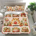 Strawberry-themed hamster bedding set displayed on a bedroom bed with matching pillowcases