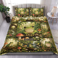 Frog duvet cover set displayed on a bed with woodland scenes, mushrooms, flowers, and green forest artwork