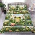 Frog duvet cover bedding set displayed on a bed with lily pads, lotus flowers, and pond scenes