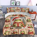 Festive frog duvet cover set styled in a bedroom with Santa hats, presents, ornaments, and Christmas greenery