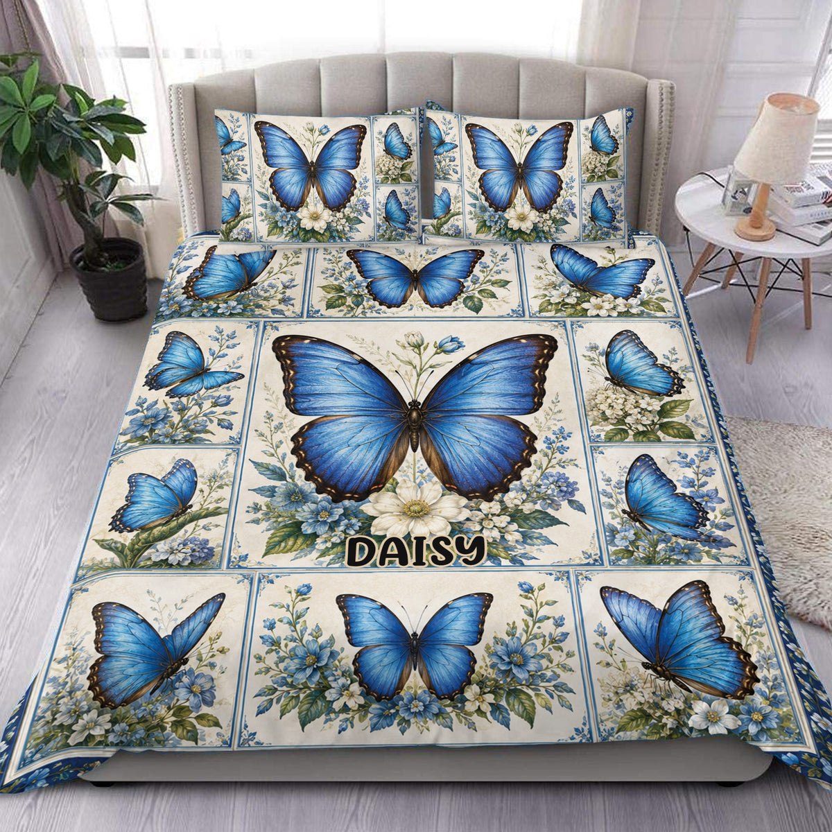 Blue butterfly duvet cover set with floral panels styled in an elegant bedroom