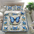 Elegant blue butterfly bedding set with floral artwork presented in a modern bedroom