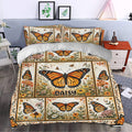 Butterfly duvet cover styled in a bedroom with orange monarch butterflies, wildflowers, and vintage panels
