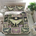Butterfly bedding set in a bright bedroom featuring floral panels, moon motifs, and a large pale green moth