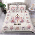 Ballet duvet cover set displayed on a bed with watercolor ballerinas, flowers, pointe shoes, and pastel artwork