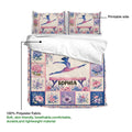 Floral gymnastics duvet cover shown partially opened with a colorful gymnast artwork and printable side
