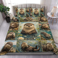 Otter duvet cover set displayed on a bed with illustrated otters, water, fish, rocks, and water lilies