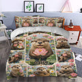 Otter duvet cover styled in a bedroom with playful wildlife portraits, pink lotus flowers, and pond scenery