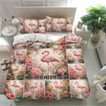 Tropical flamingo bedding set displayed in a bright bedroom with floral artwork and matching pillowcases