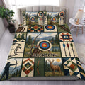 Archery duvet cover set displayed on a bed with bows, arrows, targets, mountains, forests, and rustic patchwork artwork