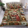 Christmas koala duvet cover set displayed on a bed with holly, ornaments, gifts, lanterns, and snowy scenes