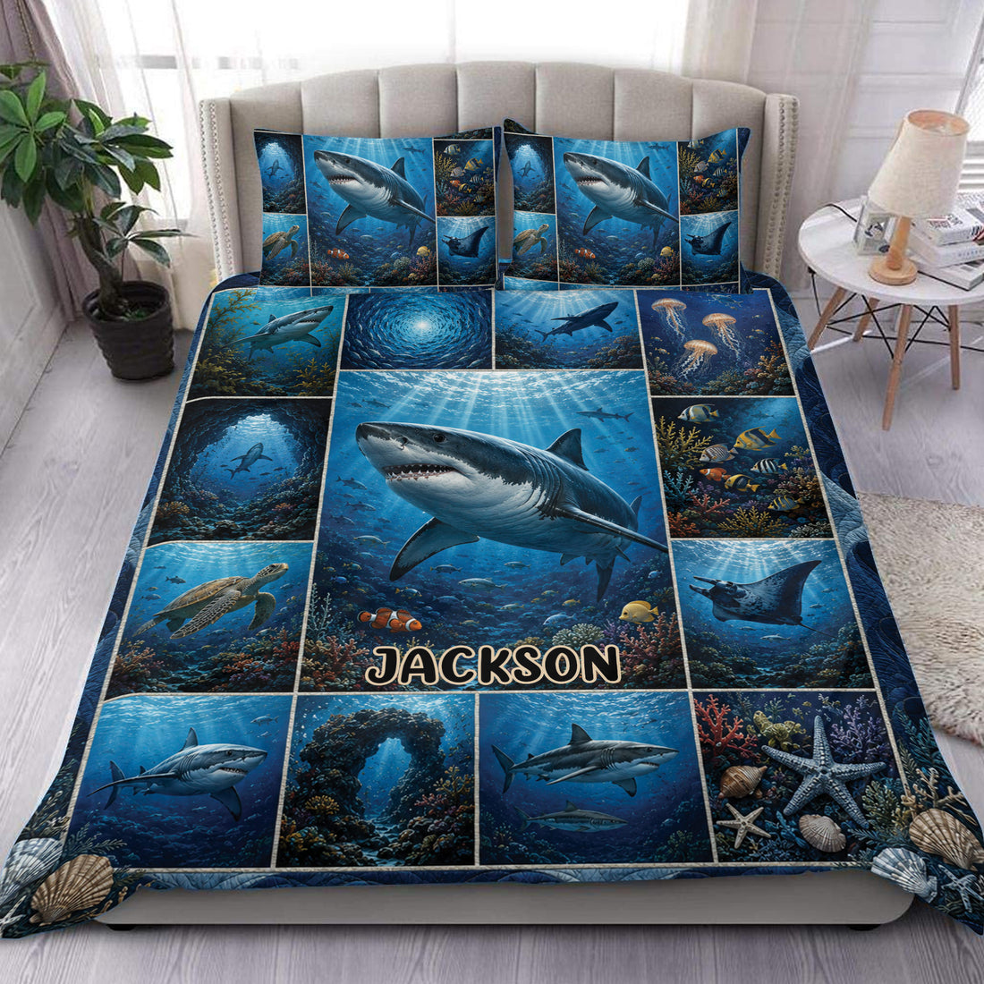 Shark duvet cover set displayed on a bed with blue underwater scenes, coral, fish, turtles, and manta rays