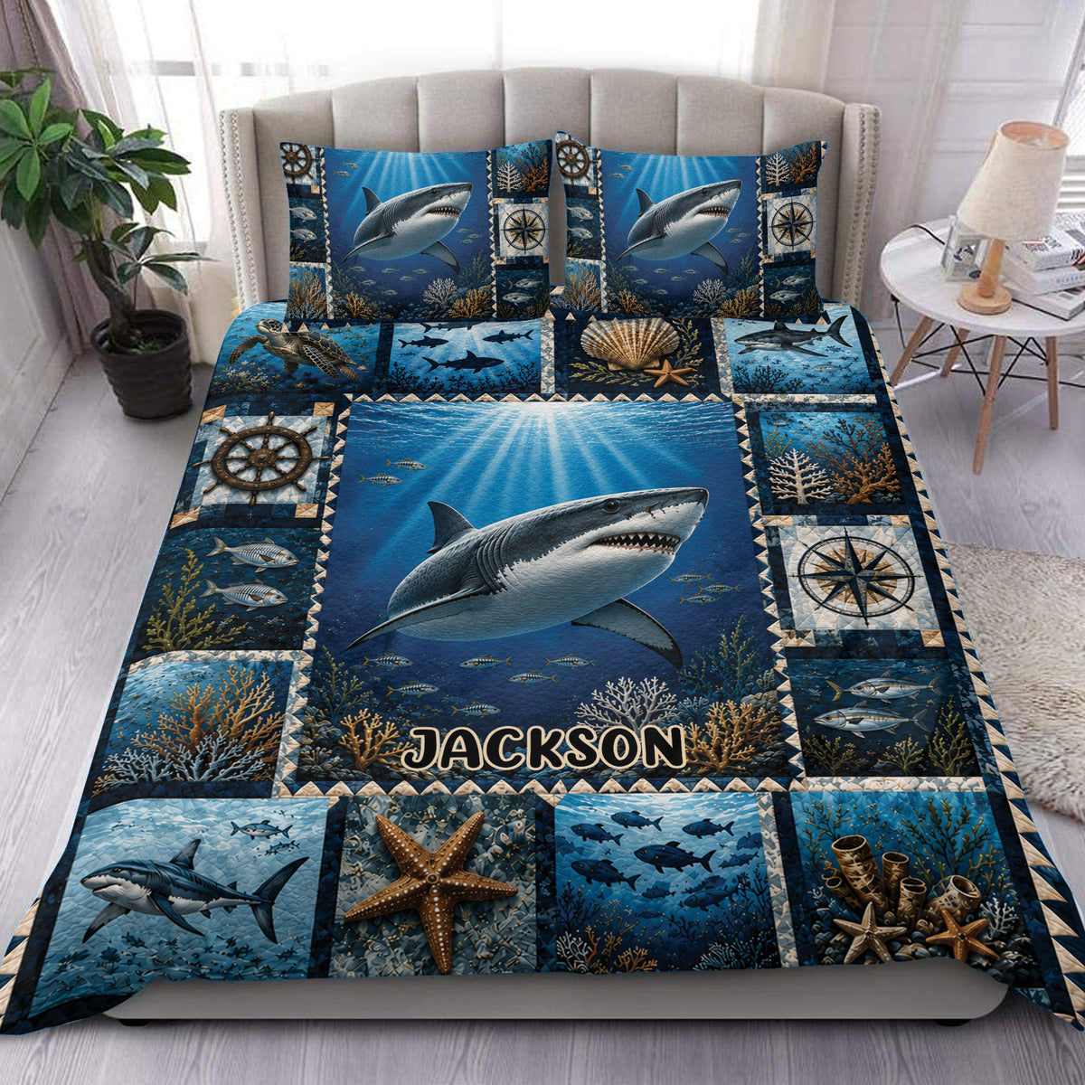 Shark duvet cover set displayed on a bed with deep blue ocean artwork, coral reefs, fish, and nautical compass details