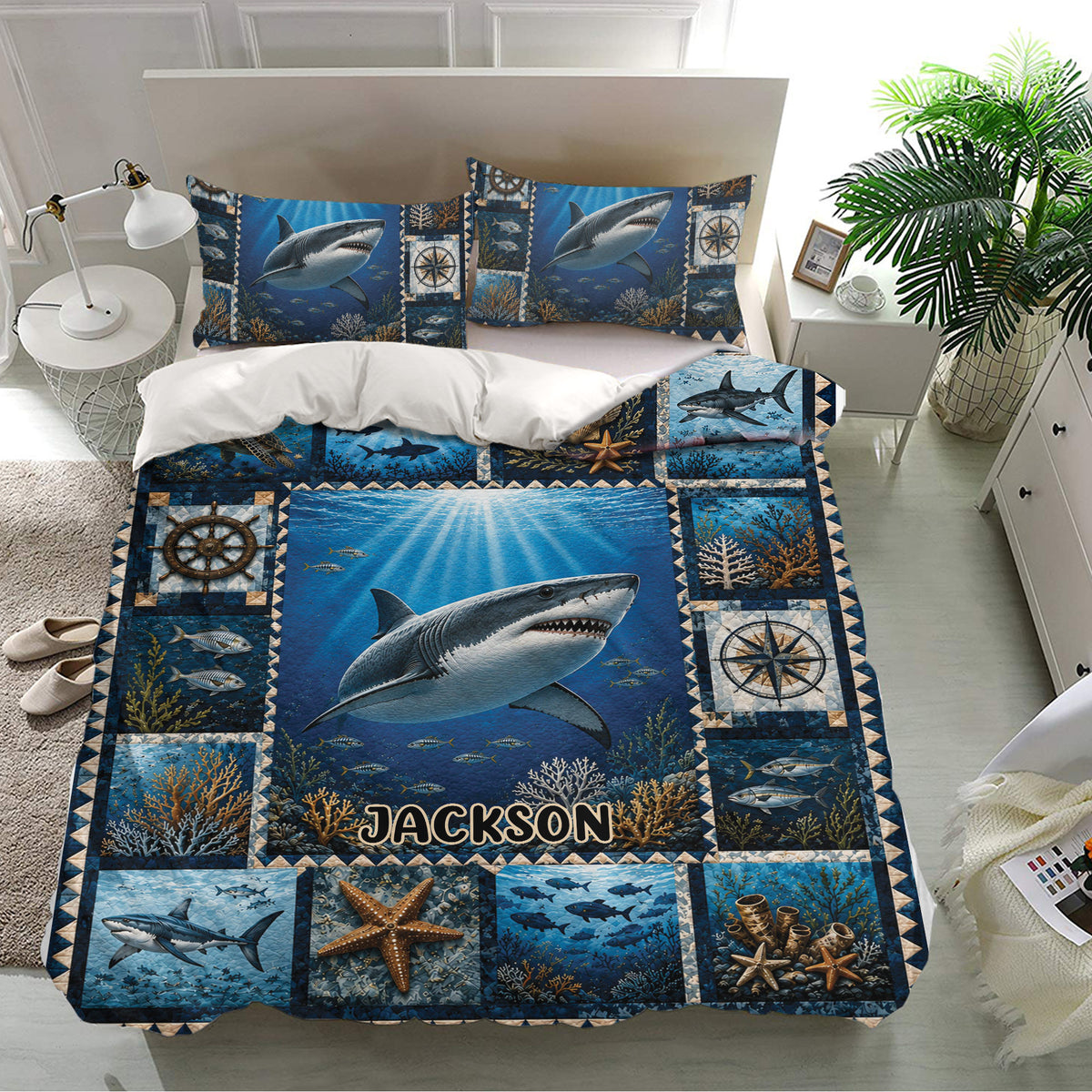 Shark bedding set displayed in a bright bedroom with underwater artwork, matching pillowcases, coral, fish, and nautical details
