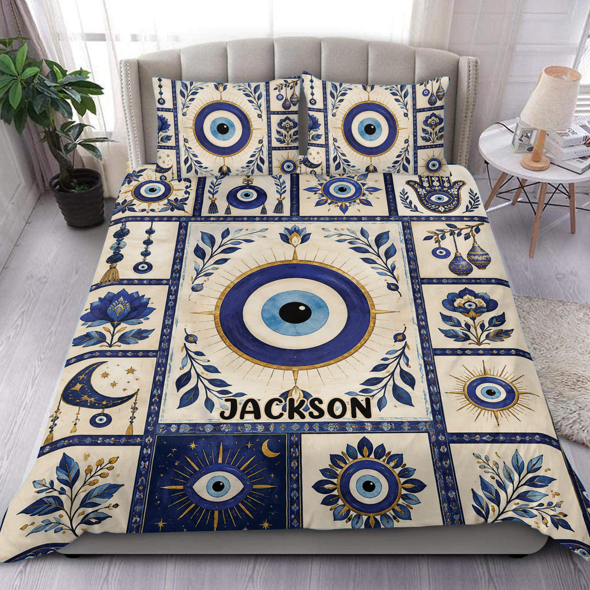 Blue and gold evil eye duvet cover set styled on a bedroom bed with matching printed pillowcases