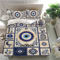 Evil eye duvet cover bedding set in a bright bedroom with blue, cream, and gold decorative motifs