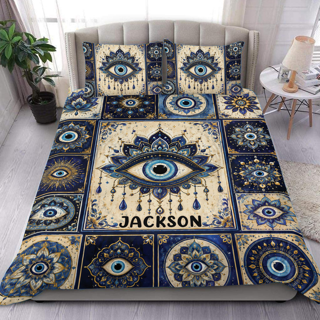 Evil Eye duvet cover set displayed on a bed in navy blue, cream, gold, and turquoise
