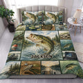 Fishing duvet cover set displayed on a bed with bass, lake scenes, fishing gear, and a custom center name