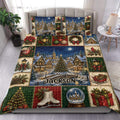 Christmas duvet cover set displayed on a bed with a snowy village, decorated tree, gifts, lanterns, and holiday patchwork