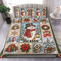 Christmas duvet cover set displayed on a bed with snowmen, wreaths, gifts, lanterns, and snowy trees