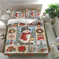Christmas bedding set featuring snowmen, poinsettias, wreaths, gifts, cardinals, and snowy woodland scenes