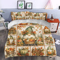 Autumn gnome duvet cover styled in a bedroom with pumpkins, woodland cottages, mushrooms, and falling leaves