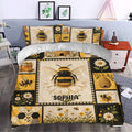 Bee duvet cover displayed in a bedroom with honeybees, flowers, beehives, and honeycomb patterns