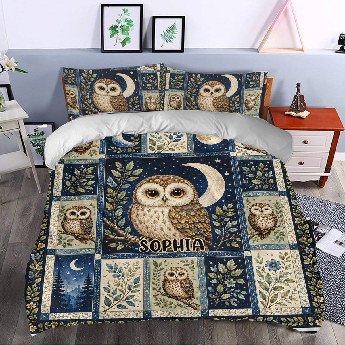 Owl duvet cover bedding set styled in a bedroom with detailed woodland owl artwork and dark blue botanical panels