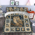 Owl duvet cover bedding set styled in a bedroom with navy botanical panels, moon motifs, and detailed owl artwork