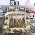 Bear duvet cover styled in a bedroom with pine trees, woodland animals, mountains, and a cozy cabin scene