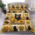Bear duvet cover set with sunflower panels and rustic wildlife artwork styled in a bright bedroom