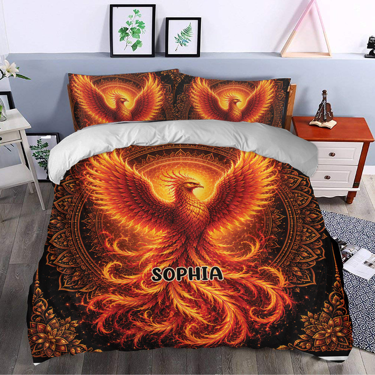 Fiery phoenix duvet cover styled in a bright bedroom with bold black, orange, and gold artwork
