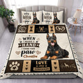 Doberman duvet cover set displayed on a bed with black and tan dog artwork, paw prints, hearts, and bold lettering