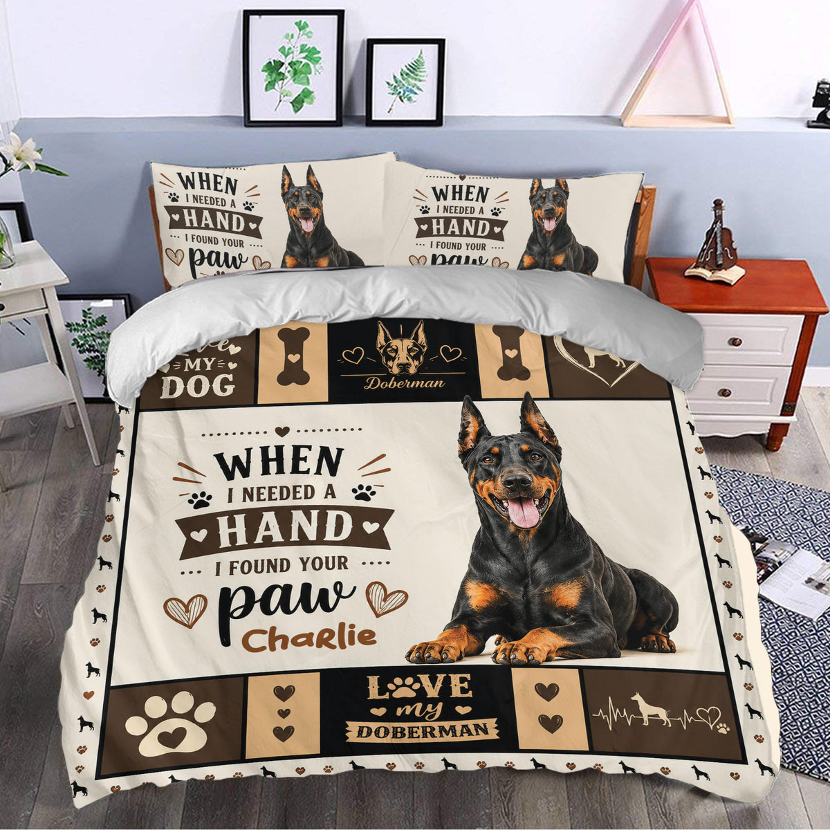 Doberman duvet cover bedding set styled in a bedroom with a large dog portrait, paw prints, bones, and hearts