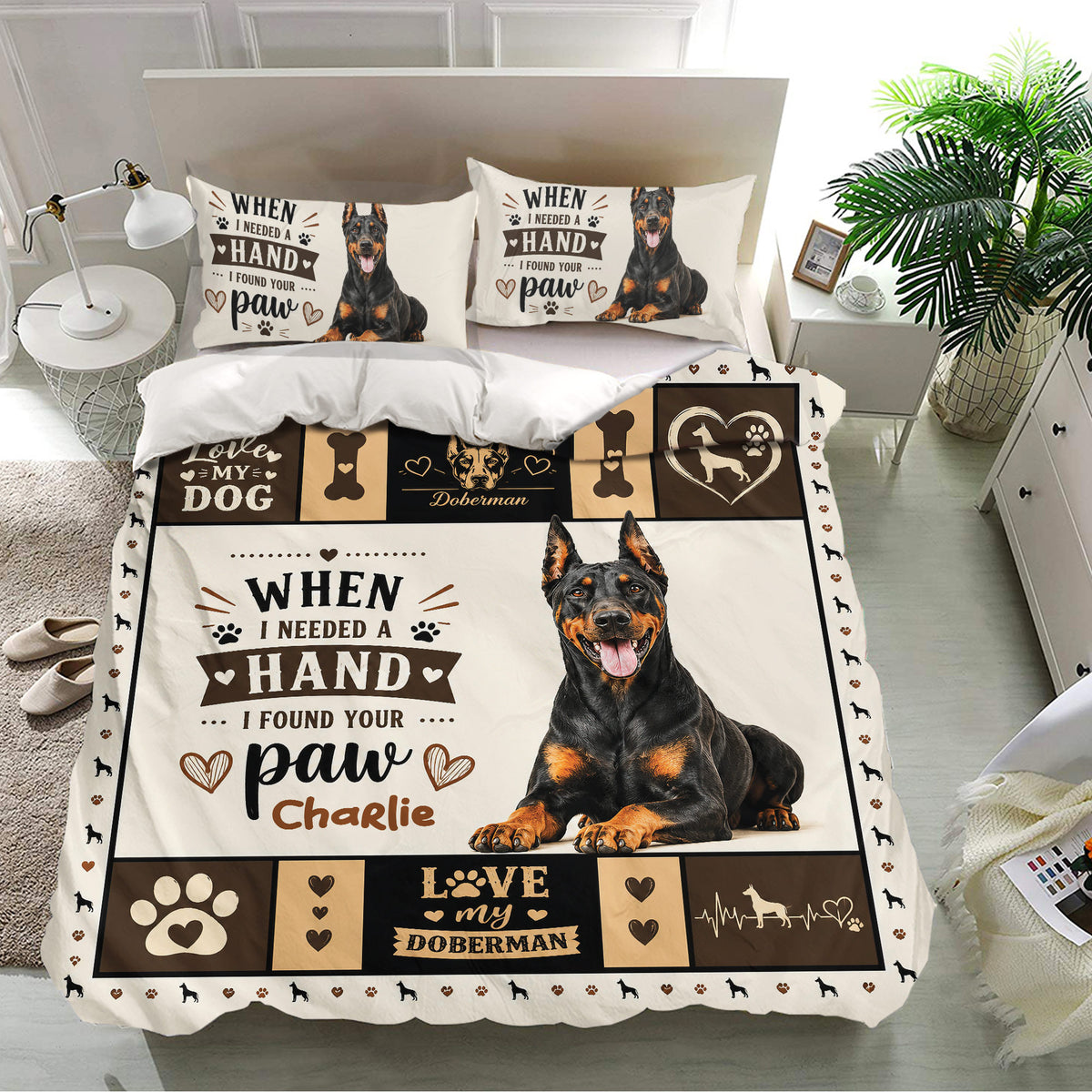 Doberman bedding set displayed in a bright bedroom with matching dog portrait pillowcases and bold black and tan panels