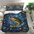 Fishing bedding set with large bass design, colorful tackle details, and matching blue pillowcases in a bedroom