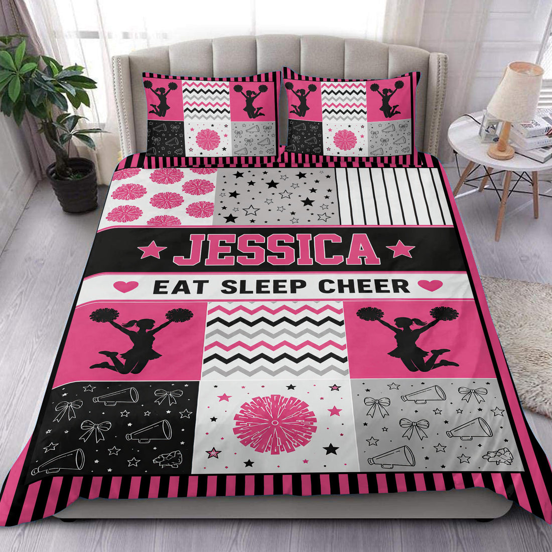 Pink and black cheerleading duvet cover set with pom-pom silhouettes, stars, megaphones, and bold bedroom styling