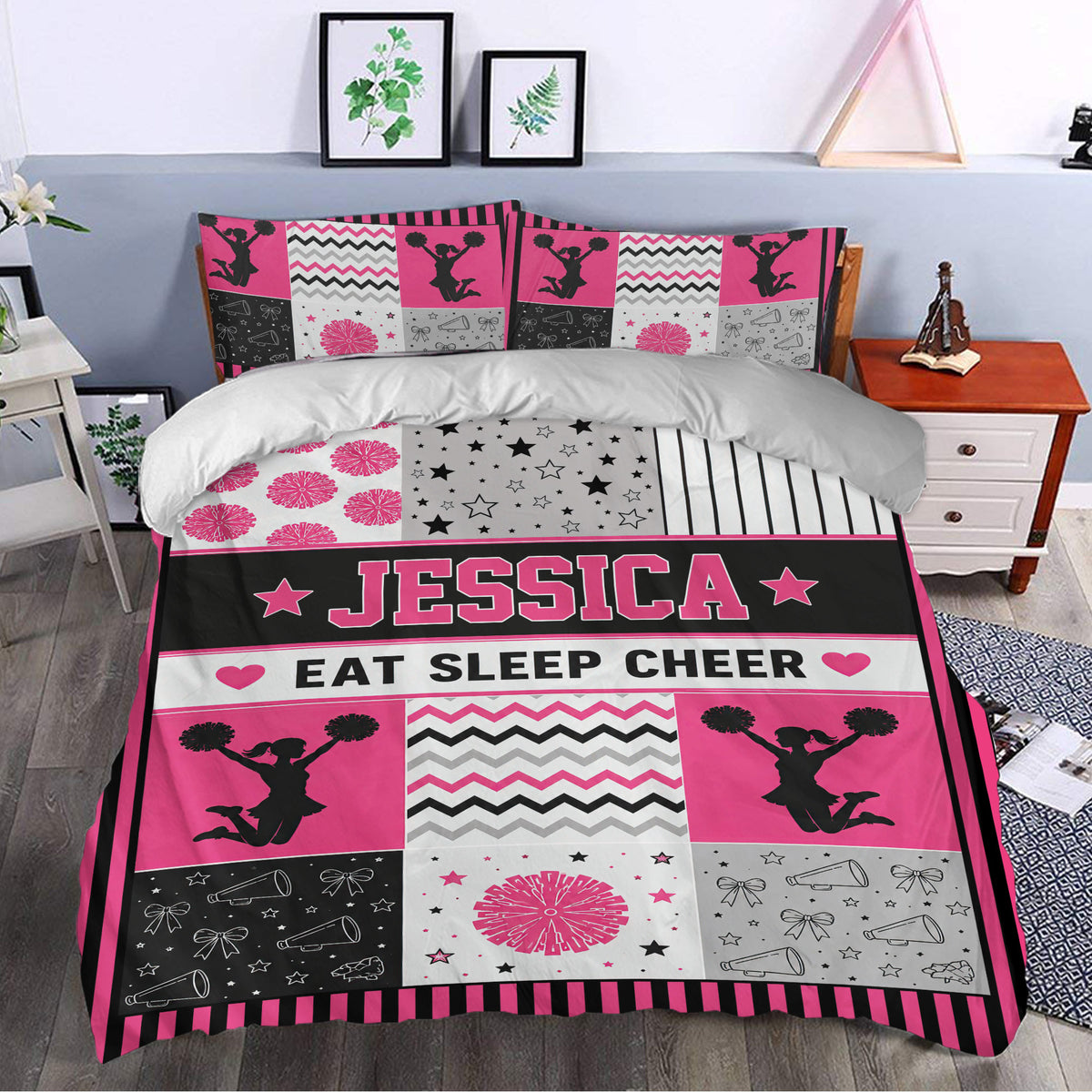 Cheerleading duvet cover bedding set styled in a bedroom with pink pom-pom silhouettes and star details