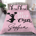 Pink cheerleading duvet cover set with black cheerleader silhouette, pom-poms, and bold Eat Sleep Cheer design