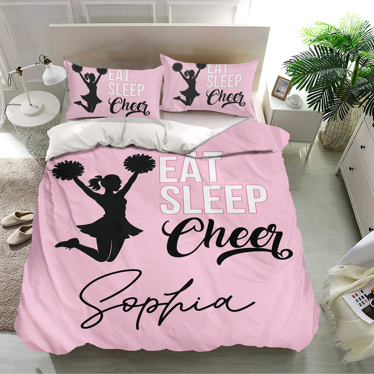 Pink cheerleading duvet cover set styled in a bright bedroom with matching pillowcases and energetic cheer artwork