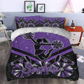 Purple cheerleading duvet cover set styled in a bright bedroom with glitter stars and pom pom artwork