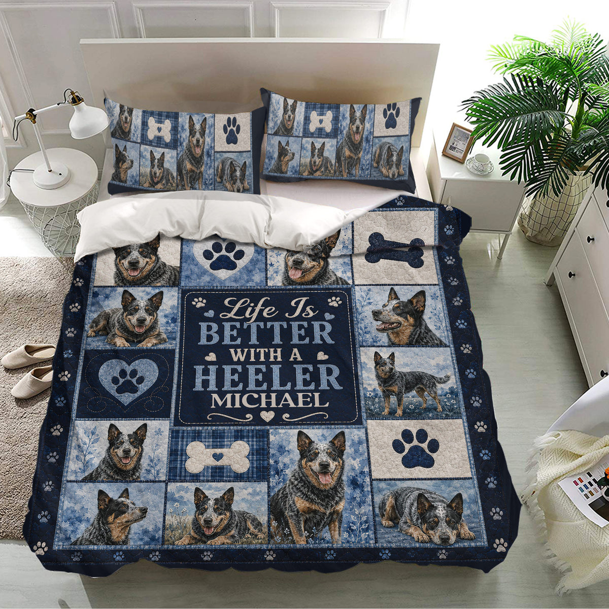 Australian Cattle Dog bedding set on a bed with blue patchwork panels, paw prints, bones, and heeler portraits