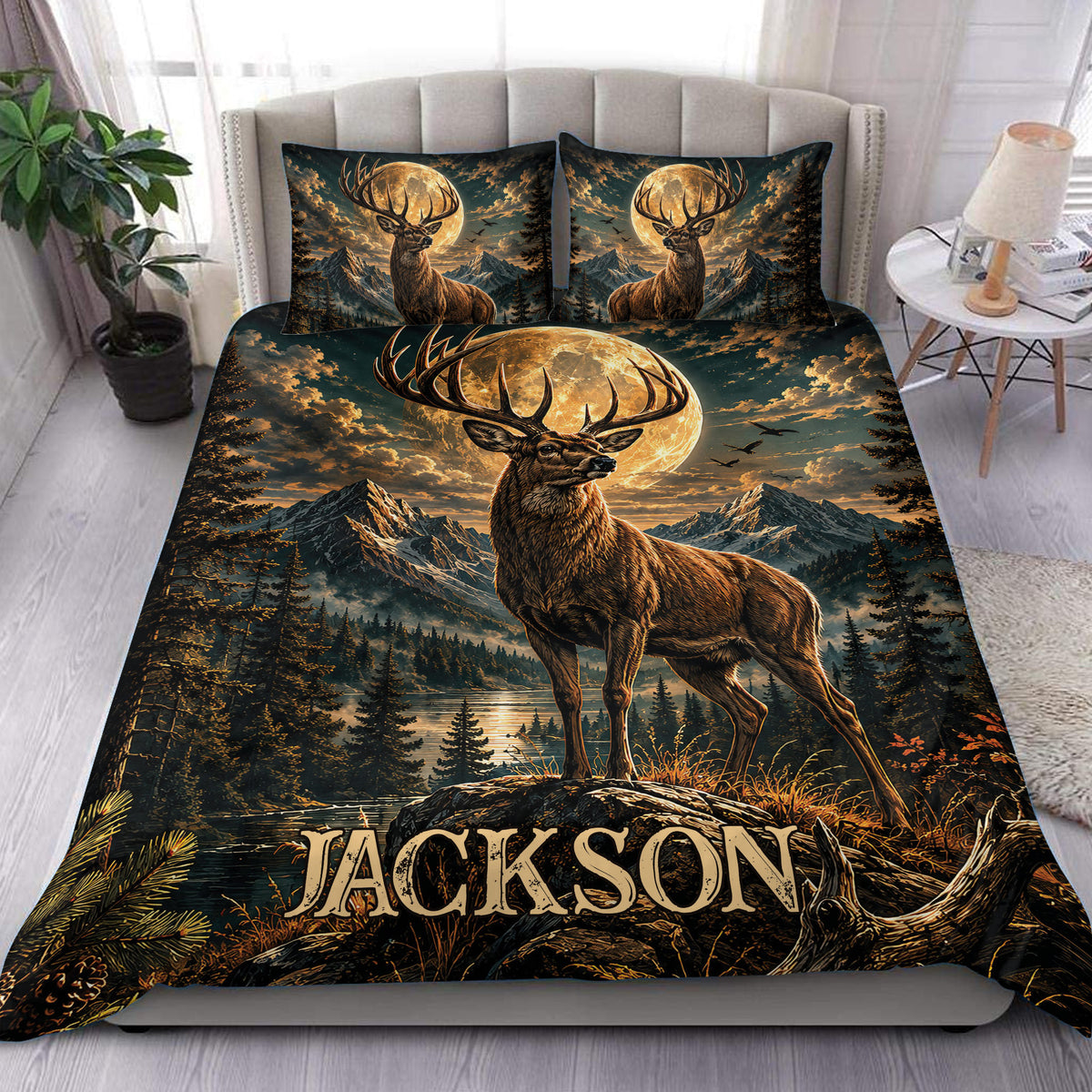 Deer duvet cover set displayed on a bed with a stag, moonlit mountains, pine forest, and lake artwork